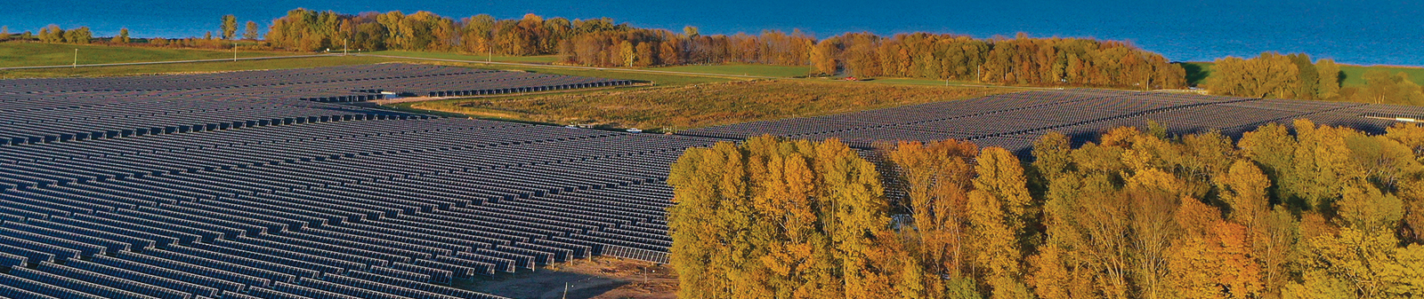 solar panel angling into sunset